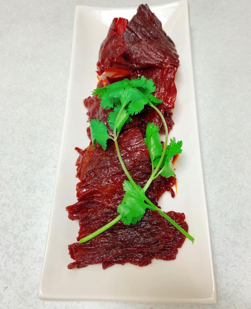 Thai / Lao Beef Jerky  · Marinated beef overnight with our uni(que recipe, dehydrated  and deep fried.