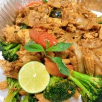 Drunken Noodle Chicken  · Pan fried flat rice noodle with sweet chili sauce, eggs, onion, bell pepper, broccoli, tomat...