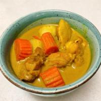 Yellow Curry Chicken  · Yellow curry paste cooked with carrot, potato and coconut milk. 