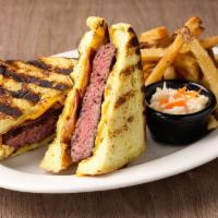 Bacon grilled cheese burger · Our famous burger pressed in a bacon grilled cheese on buttery Texas toast