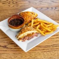 French Onion Roast Beef Sandwich · Thinly sliced hot roast beef topped with caramelized vidalia onion and melted swiss cheese o...