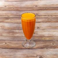 Jugo de Zanahoria · Carrot juice.