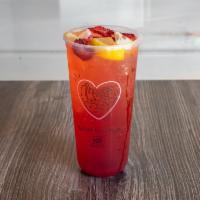 Strawberry Lemonade · House made lemonade shaken with strawberry puree, topped with fresh lemon and strawberry bit...