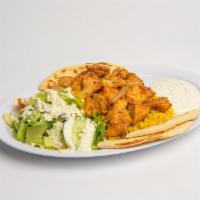 Chicken Gyro Plate · Tender marinated chicken breast served with tzatziki sauce , Rice, Greek salad and Pita bread.