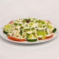 Greek Salad · Fresh romaine lettuce, tomatoes, olives, cucumbers and onions  topped with garlic sauce and ...