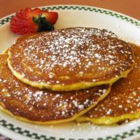 Fruit Pancakes · Filled with choice of strawberry blueberry, cherry or apple filling, topped with powdered su...
