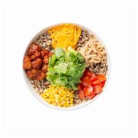 Smoky BBQ Crispy Chicken Warm Grain Bowl · This Chef-inspired Signature starts with a base of Super Grains Blend. It is served with Smo...