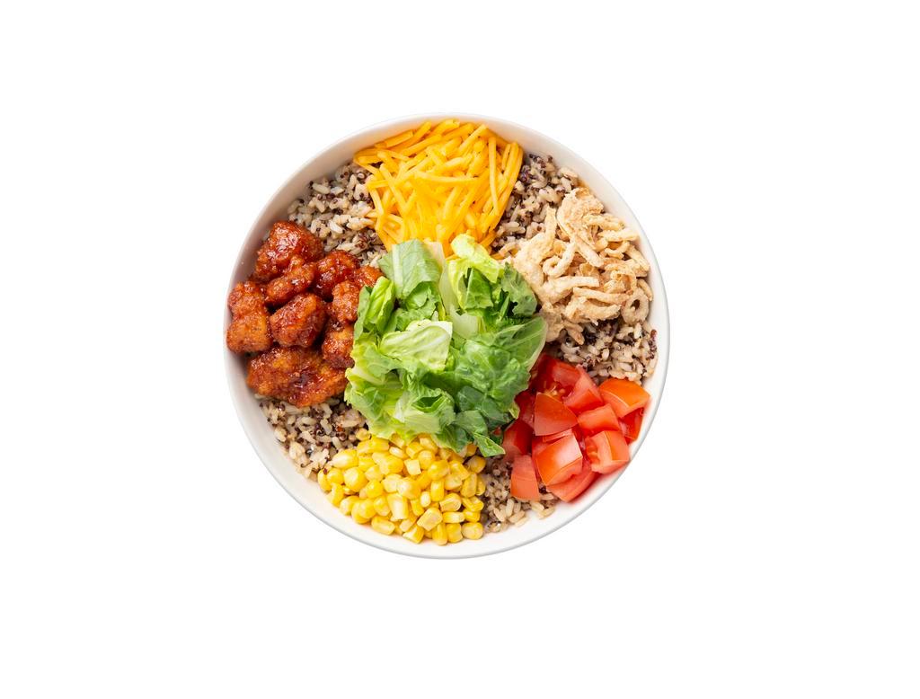 Smoky BBQ Crispy Chicken Warm Grain Bowl · This Chef-inspired Signature starts with a base of Super Grains Blend. It is served with Smoky BBQ Crispy Chicken, Diced Tomatoes, Sweet Corn, Cheddar Cheese and Onion Crisps. We recommend our Ranch dressing.