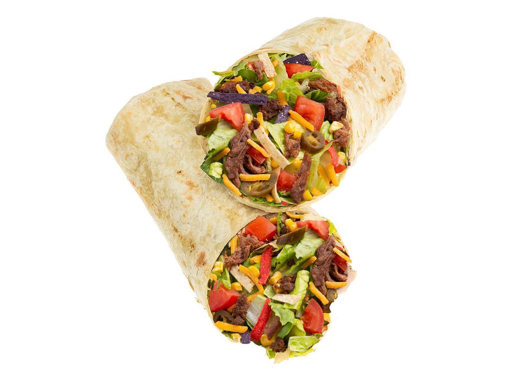 Beef Taco Fiesta Wrap · Say Ole’ to the Fiesta: romaine/iceberg blend or super greens blend, warmed braised beef, diced tomatoes, cheddar cheese, jalapenos, sweet corn, tri-color tortilla strips, with salsa ranch dressing.