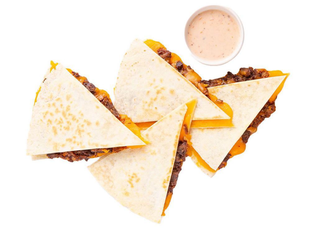 Braised Beef Quesadilla · Say Ole’ to the Fiesta: Tortilla (white or wheat), cheddar cheese, braised beef.