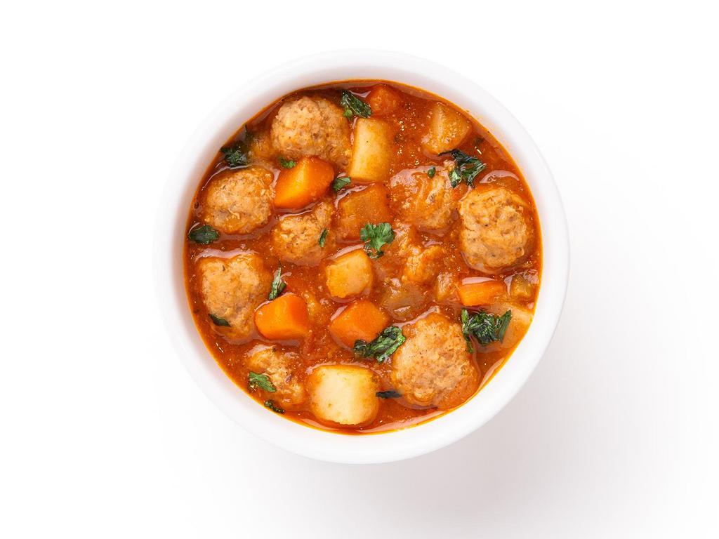 Meatball Soup · Spicy peppers, zesty lime juice and cool cilantro accent this traditional Mexican Style Albondigas soup made with flavorful vegetables and hearty meatballs.
