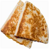 Kids Grileld Chicken Quesadilla · Our Grilled Chicken is Panini-pressed with cheese into an ooey-gooey Quesadilla that is high...