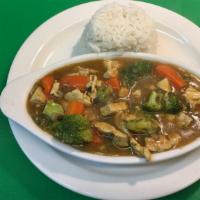 Chicken Curry Special · Onions mushrooms, broccoli and carrots in curry sauce served with rice.
