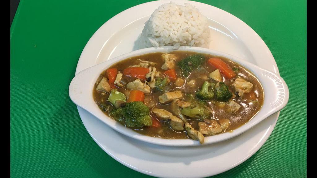 Chicken Curry Special · Onions mushrooms, broccoli and carrots in curry sauce served with rice.