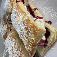 CREAM PUFF · Fresh cream and raspberry coulis in puff pastry