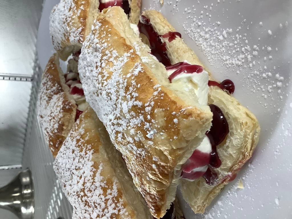 CREAM PUFF · Fresh cream and raspberry coulis in puff pastry