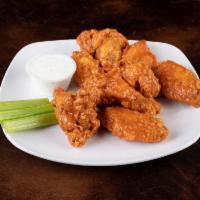 Chicken Wings · Tossed in a choice of sauce, these huge wings will satisfy and appetite. If you would like n...