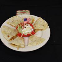 Quesadilla Grande · With ground beef or shredded chicken accompanied by a side of rice and salad (lettuce, pico ...