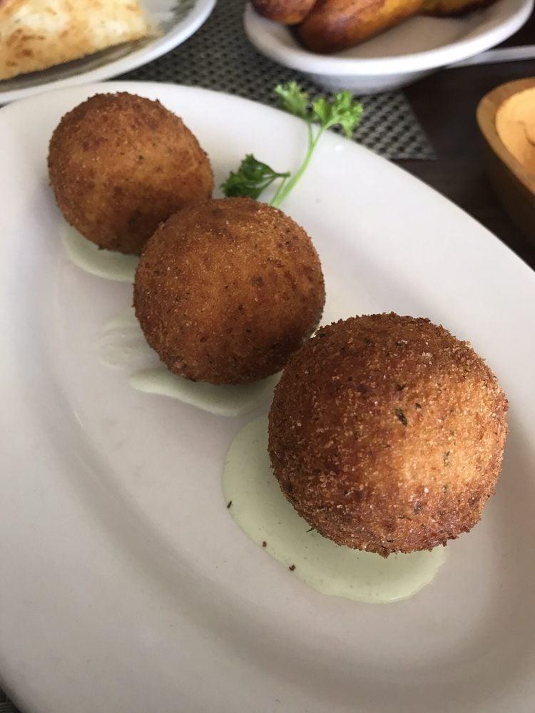 Papa Rellena · Mashed potato ball stuffed with beef, chicken or cheese, lightly battered, and fried to crispy perfection.