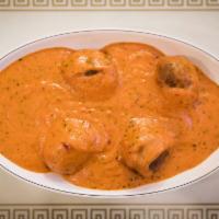 Malai Kofta · Homemade cheese stuffed in vegetable balls, cooked in a mildly spices creamy, and almond sau...