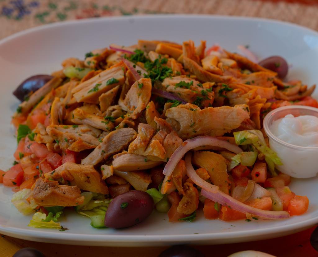 Mediterranean Salad with Chicken Plate · Halal chicken served fresh on Mediterranean salad made daily.