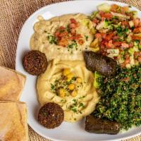 Combo Veggie Plate · Hummus, baba ghanoush, med and tabbouleh salad, falafel and dolma.