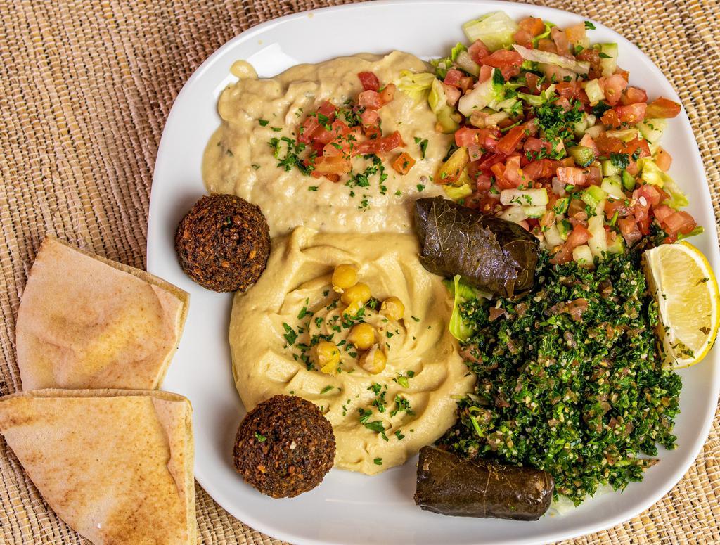 Combo Veggie Plate · Hummus, baba ghanoush, med and tabbouleh salad, falafel and dolma.