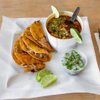 Combination Plate Tacos · Comes with 3 tacos with side of rice and beans.