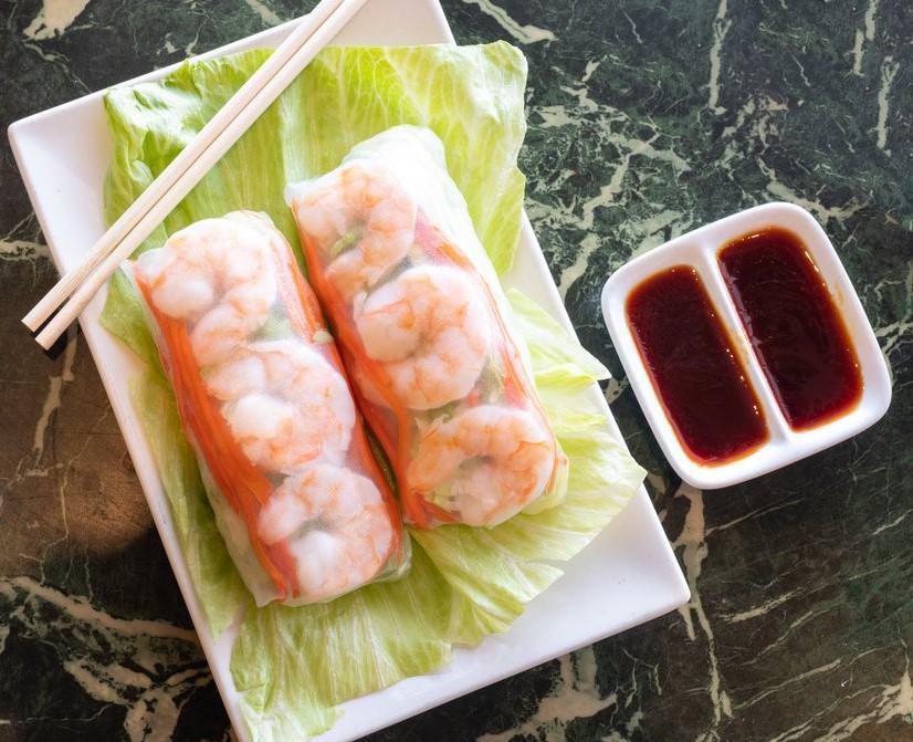 Shrimp Spring Rolls (2 ) · Shrimp and pickled vegetables wrapped in rice paper.
