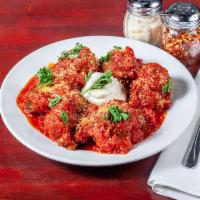 Baked Meatballs · Seasoned prime beef with Parmesan cheese, fresh garlic herbs slow cooked in our signature ho...
