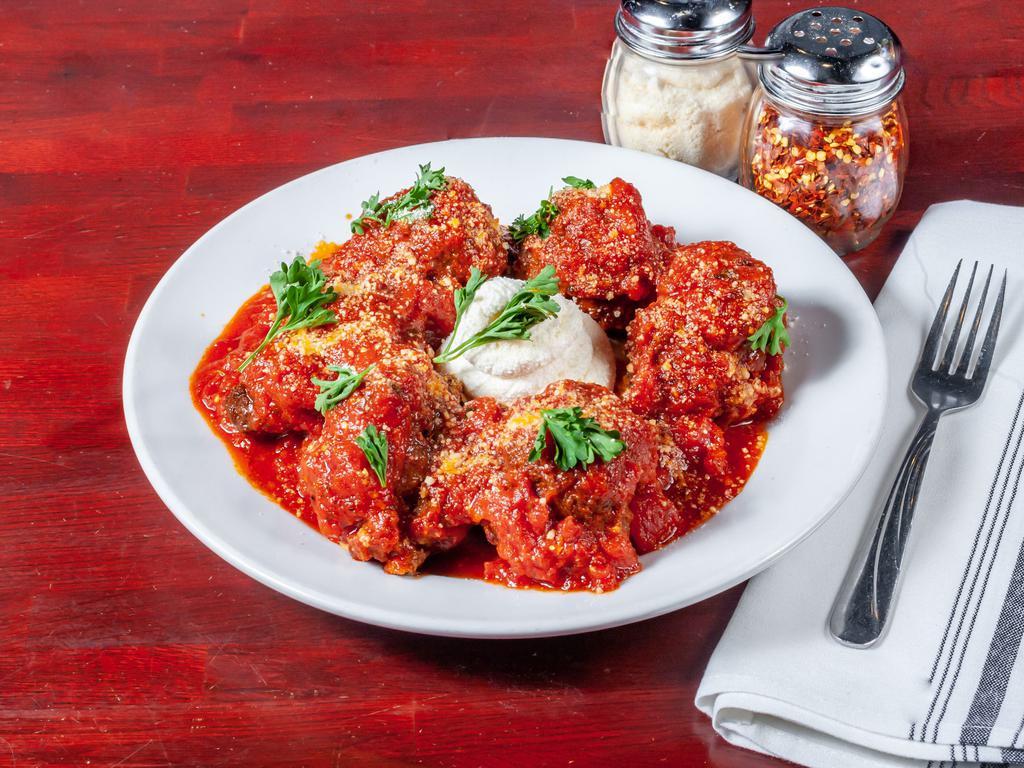 Baked Meatballs · Seasoned prime beef with Parmesan cheese, fresh garlic herbs slow cooked in our signature house gravy.