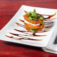 Eggplant Stack · Hand breaded eggplant layered with fresh tomato, fresh mozzarella and basil with aged balsam...
