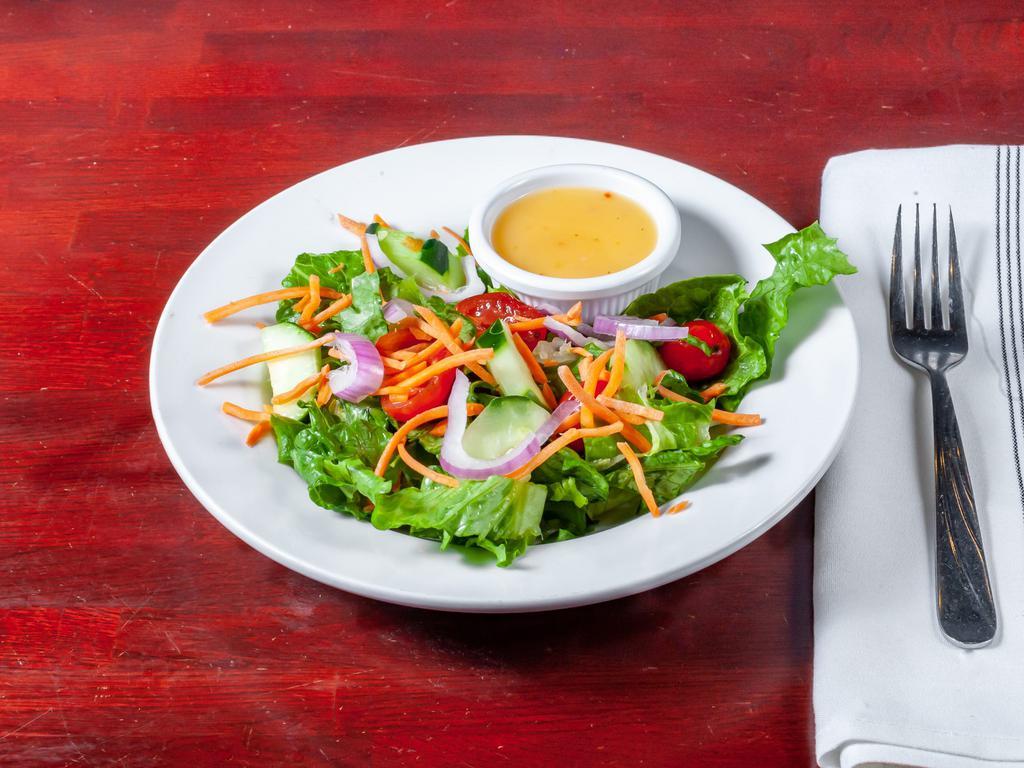 Garden Salad · Basilico favorite, lettuce, tomato, cucumber, carrot and red onion served with choice of dressing. Gluten-free.  Vegetarian. 