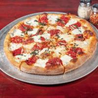 Large Margarita Pizza  · Thin crust dough topped with San Marzano tomato, fresh mozzarella, fresh basil, and roasted ...