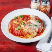 Eggplant Rollatini · Breaded eggplant rolled with ricotta and mozzarella baked in our signature red sauce served ...