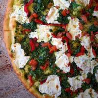 Pesto Pizza · Pesto base with spinach, roasted peppers, fresh mozzarella and tomatoes.