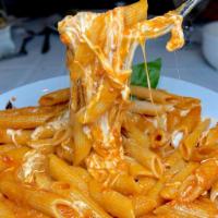 Penne Vodka · Served with a side salad and bread.