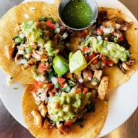 Steak Tacos · 3 tacos with onions, cilantro side, pico de gallo, guacamole and green sauce