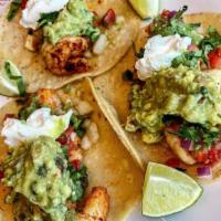 shrimp taco · 3 tacos with onions cilantro side pico de gallo guacamole and green sauce