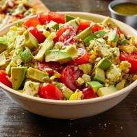 Tomato, Avocado, and Mozzarella Salad · Romaine and red leaf lettuce, cherry tomatoes, avocado, roasted corn, housemade mozzarella, ...