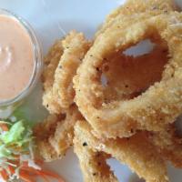 Crispy Fried calamari · Crunchy snack served with spicy mayo sauce.