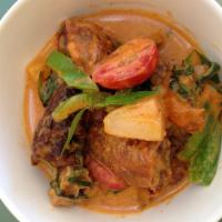 Duck Curry · Red curry roasted duck with grape tomato,bell,pineapple and basil leaves. (medium spicy)come...