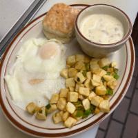 Eggs, Browns, and Gravy Combo · 2 eggs, Southern browns, sausage gravy, and a biscuit.