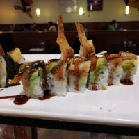 Black Dragon Roll · Shrimp tempura roll wrapped with avocado and eel.