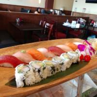 Sushi Dinner · Chef's choice of 8 pieces of sushi and a California roll. Served with your choice of miso so...