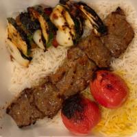 Shish Kabob · A Skewer of marinated and charbroiled beef tenderloins, onions and bell peppers.
