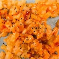 6. Pop Rock Shrimp	 · Fried shrimp with sesame seasoning, spicy mayo, and sweet chili sauce 