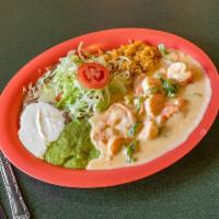 Camarones a la Crema · Shrimp with cream sauce with bell peppers and tomato. Served with sour cream, guacamole chee...
