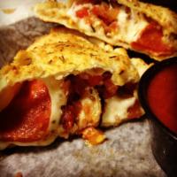 Build Your Own Calzone · Our house made marinara and mozzarella cheese included. Pick up to 4 additional ingredients....