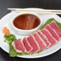 Tuna Tataki · Seared sashimi grade tuna served with ponzu sauce.